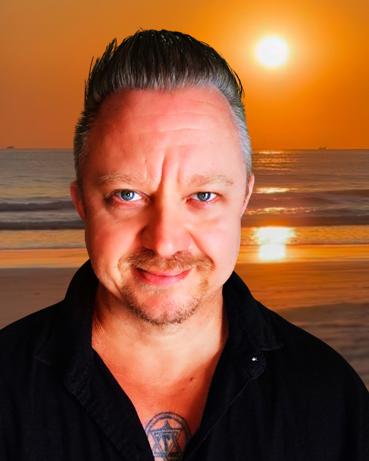 Matteo Axen by the sea at sunset